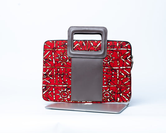 Red patterned bag with a metallic handle on a white background