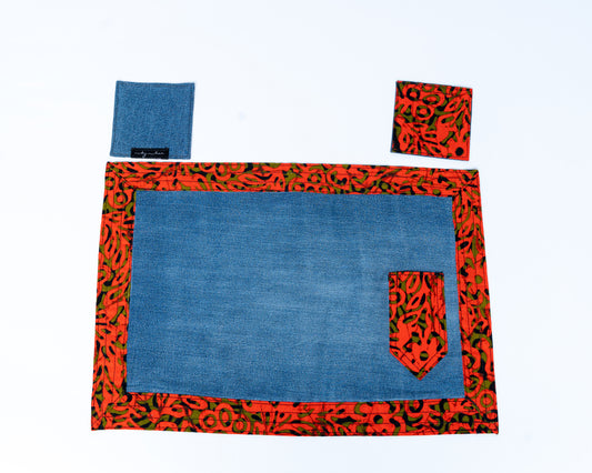 Placemat with red and green pattern on a white background