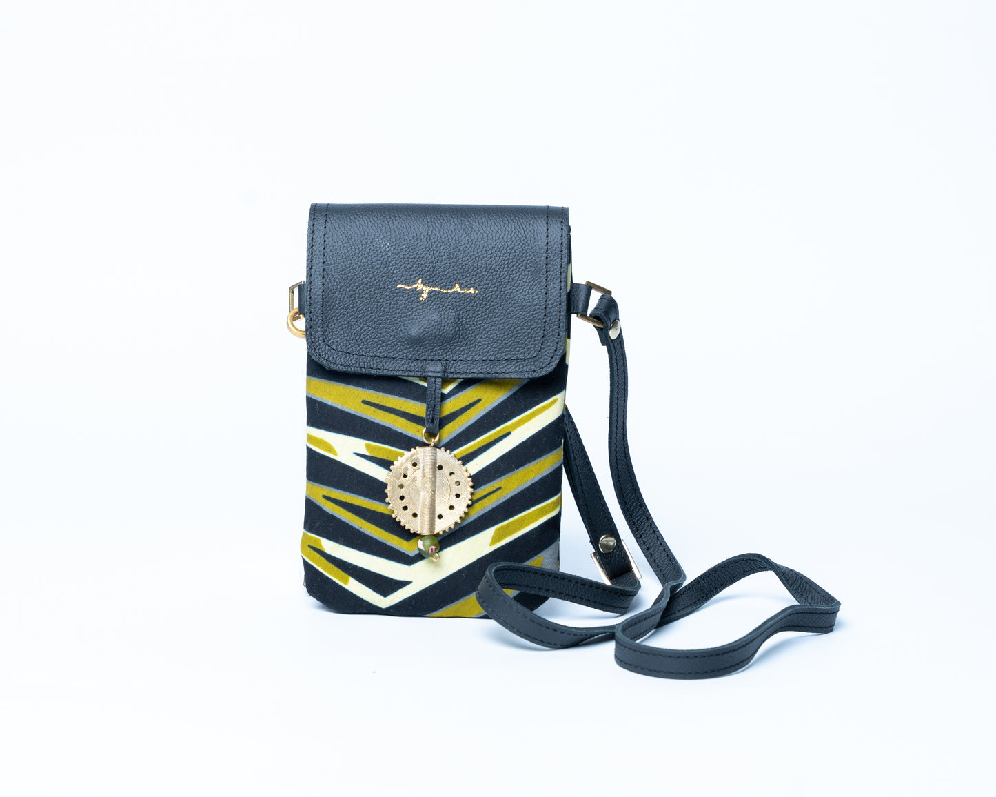 Black and yellow patterned crossbody bag on a white background
