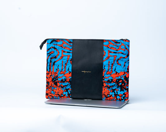 Laptop sleeve with blue and red abstract pattern on a white background